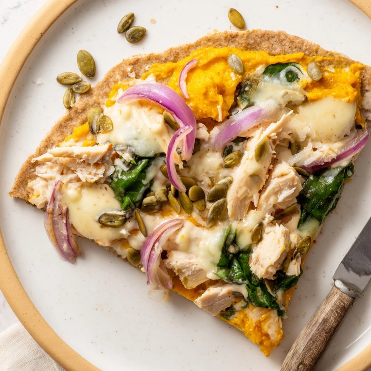 Homemade Protein Pumpkin Ricotta Pizza recipe: a healthy, cheesy slice on whole wheat.