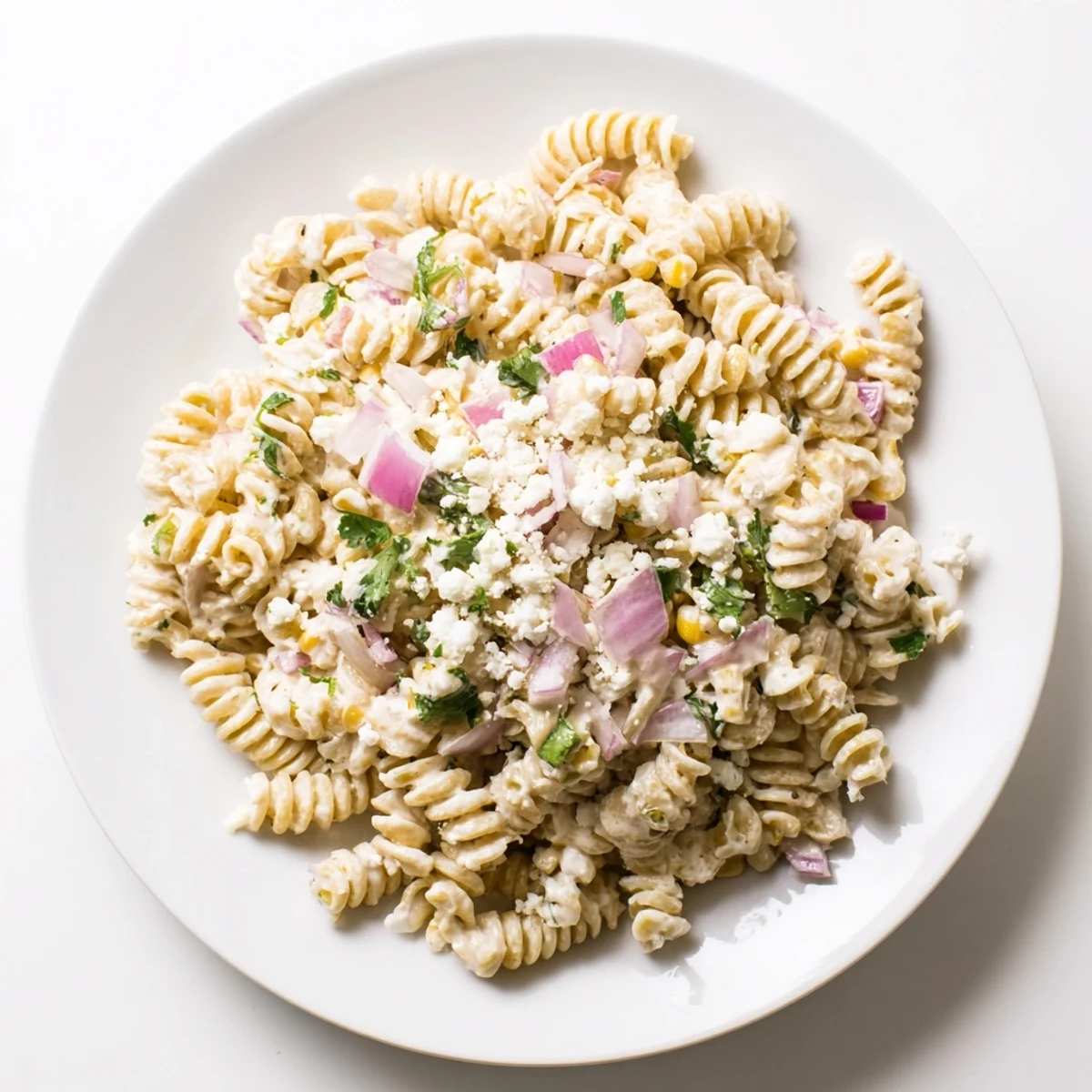 Beautiful Creamy Street Corn Pasta Salad, showcasing vibrant colors and a creamy, flavorful dressing.