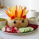 A delicious close-up of the Autumn Hedgehog Dip Platter, perfect for sharing at a fall gathering.
