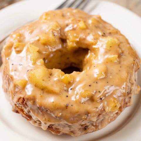 Warm spices and tender apples blend perfectly in Chai Caramel Apple Pancake Donuts.  