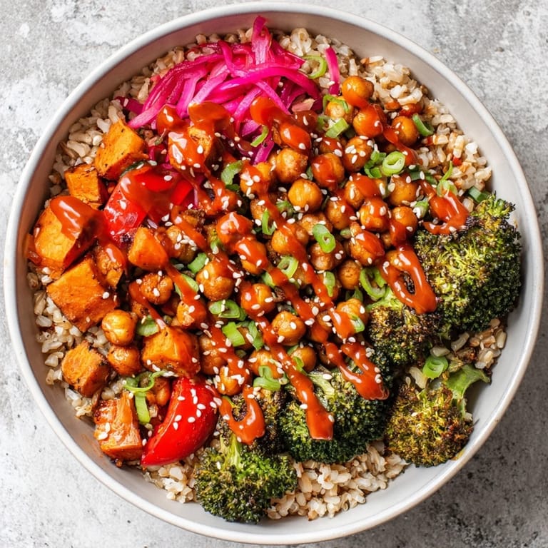 Delicious Bold Sauce Drizzle Bowls bursting with roasted vegetables and global flavors.