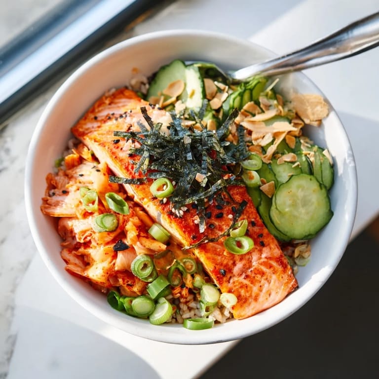 Perfectly cooked crispy salmon rice bowl showcasing vibrant colors and mouthwatering textures.