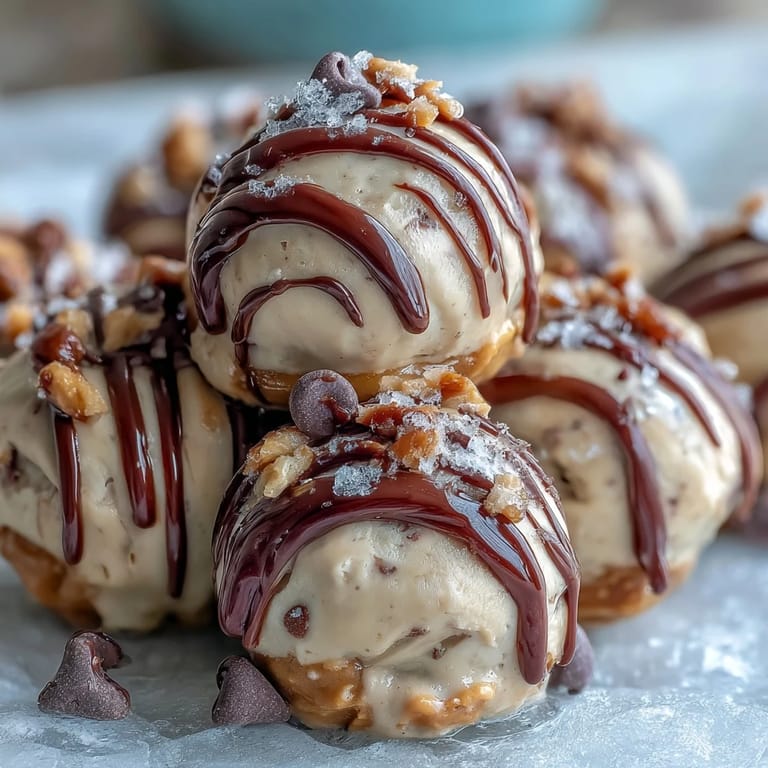 Homemade frozen Greek yogurt peanut butter bites topped with chia seeds, ideal for healthy snacking or dessert.
